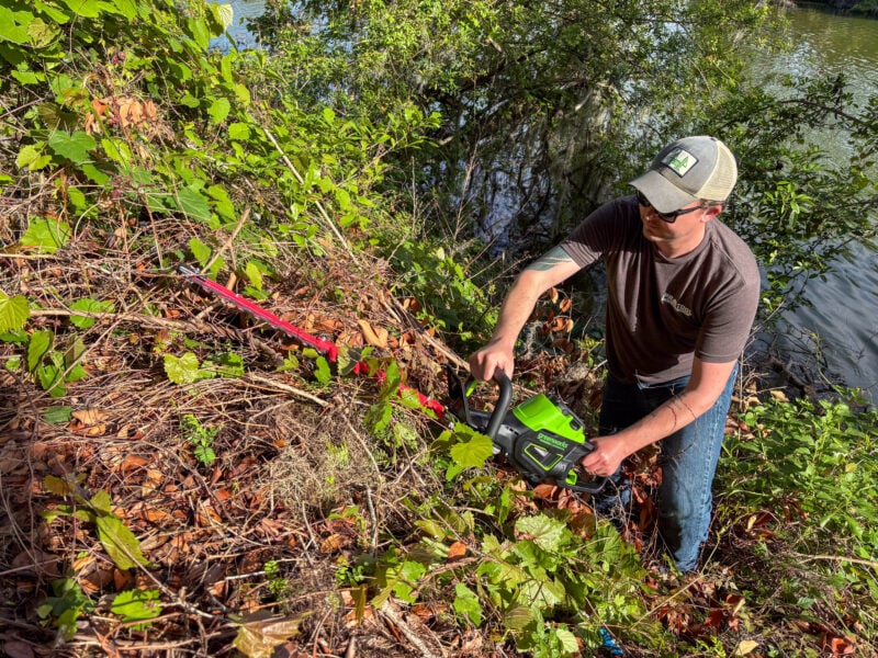 Greenworks Commercial Hedge Trimmer in action
